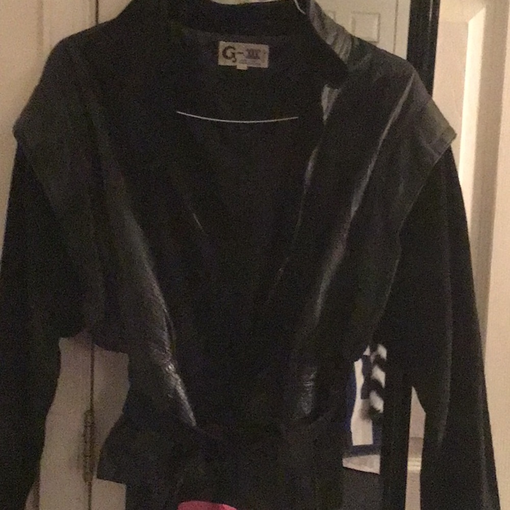 Leather jacket with a belt around the waist
